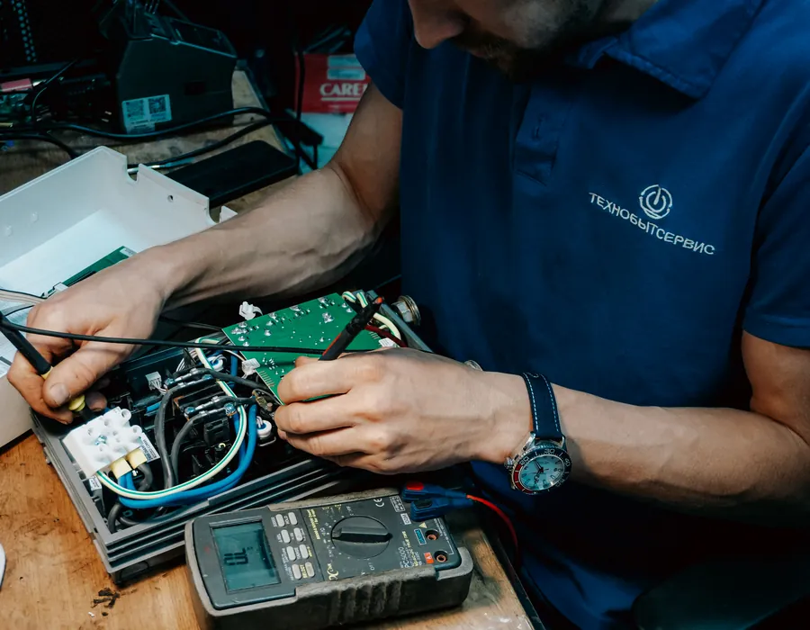 Technician repairing electronic components